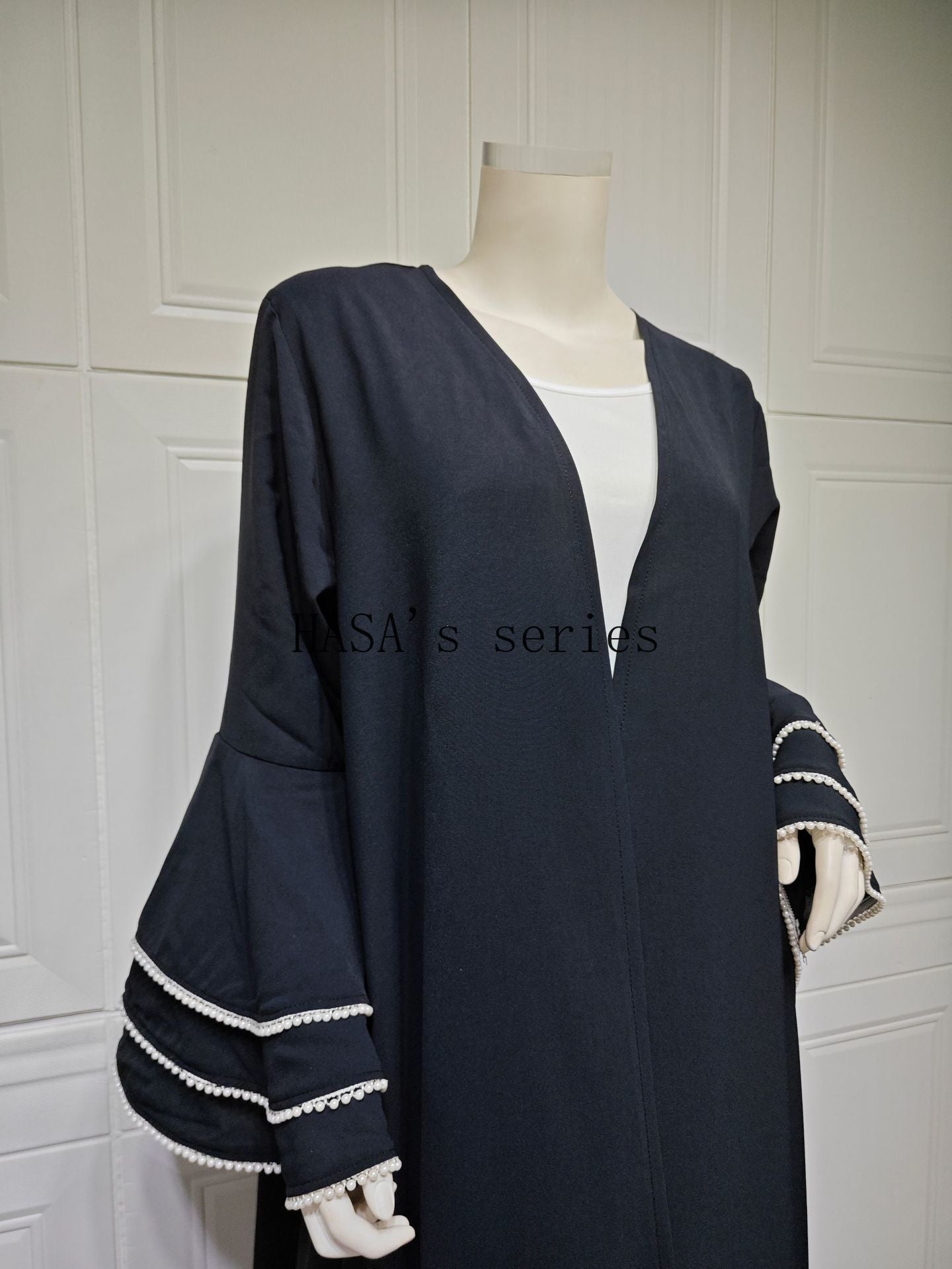 LUMAYA5093 Elegant black cardigan-style long robe with wide sleeves and a round-neck dress design featuring beaded embellishments.
