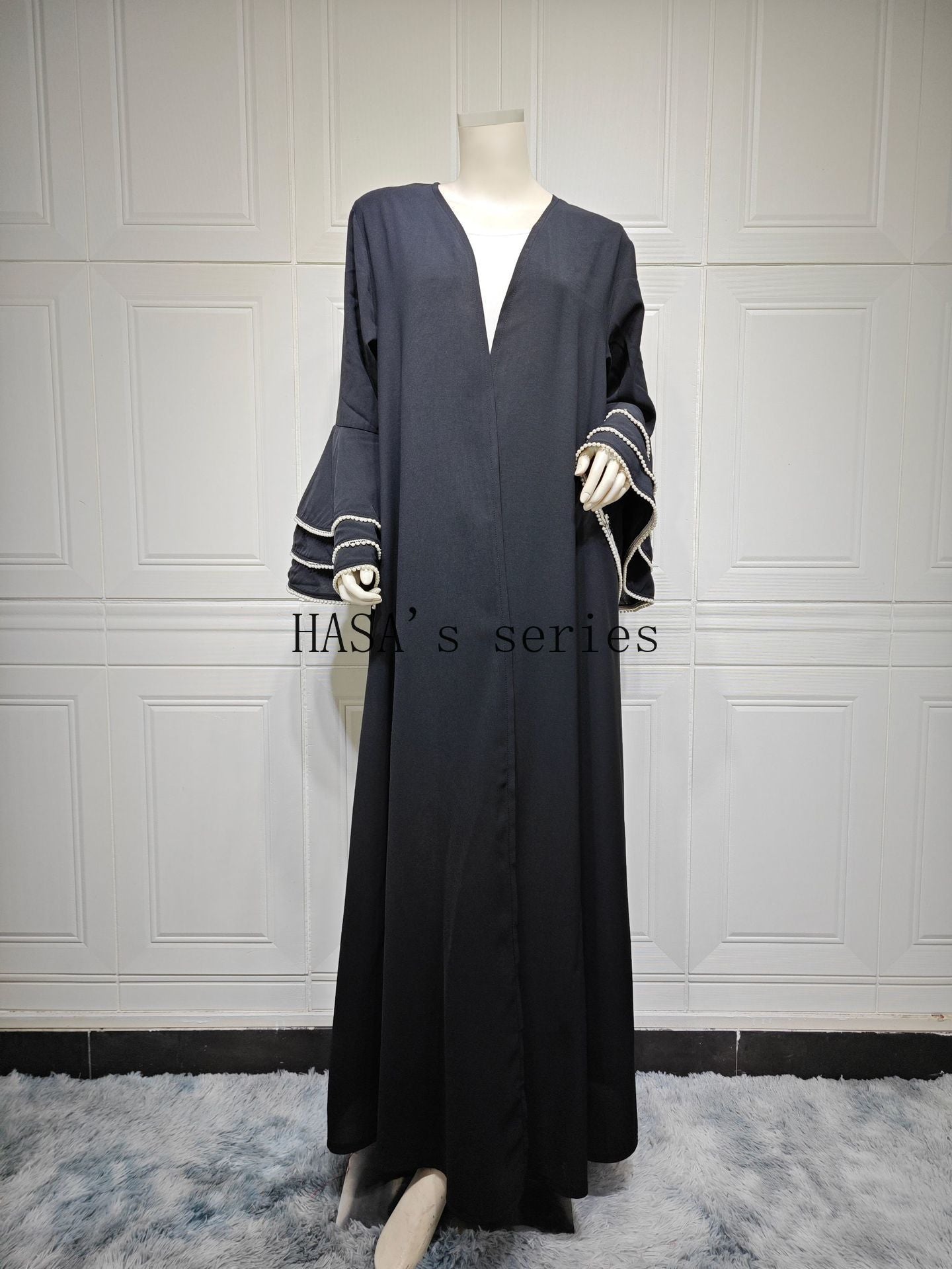 LUMAYA5093 Elegant black cardigan-style long robe with wide sleeves and a round-neck dress design featuring beaded embellishments.
