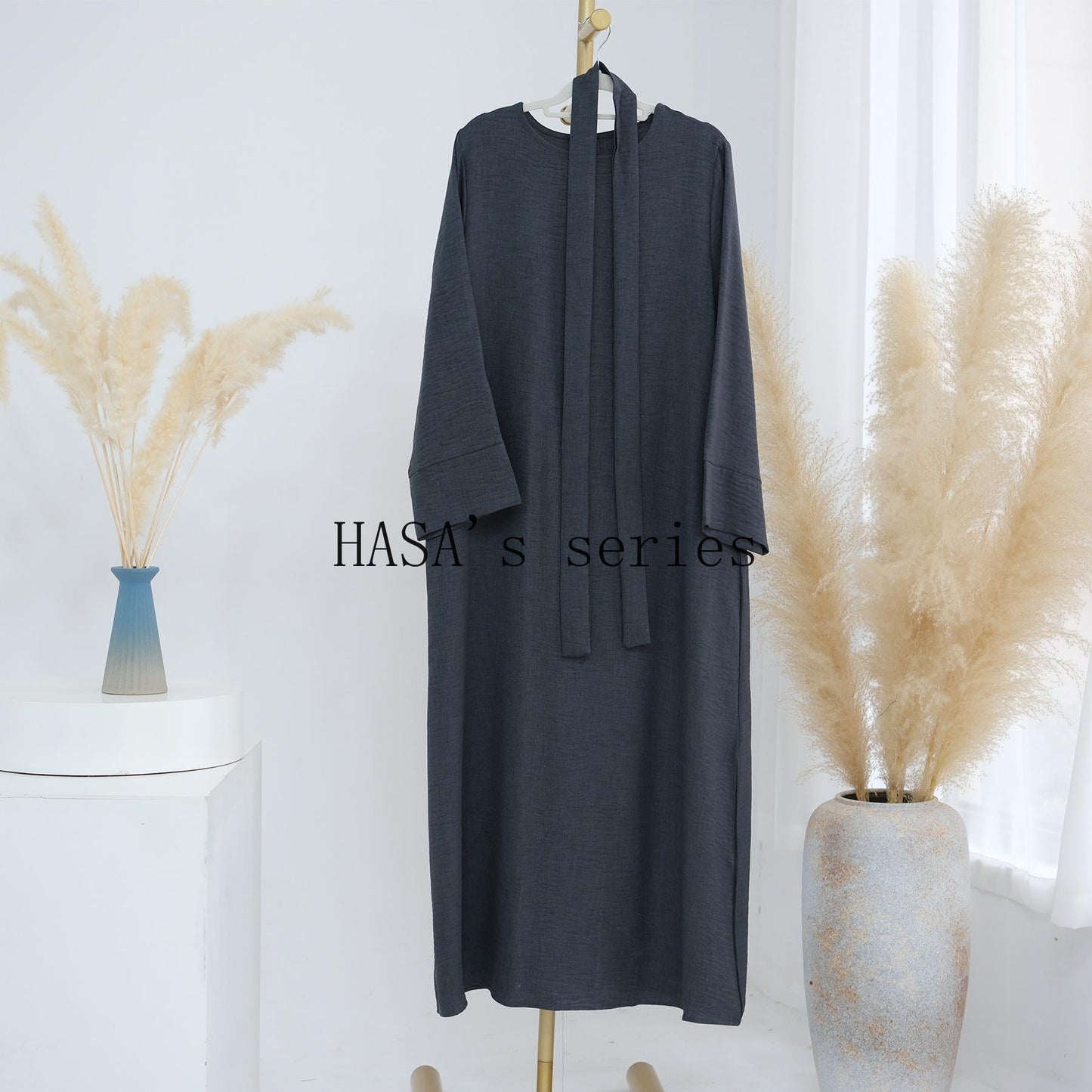 LUMAYA4848 A simple, waist-cinching spring/summer dress with a relaxed, long design.