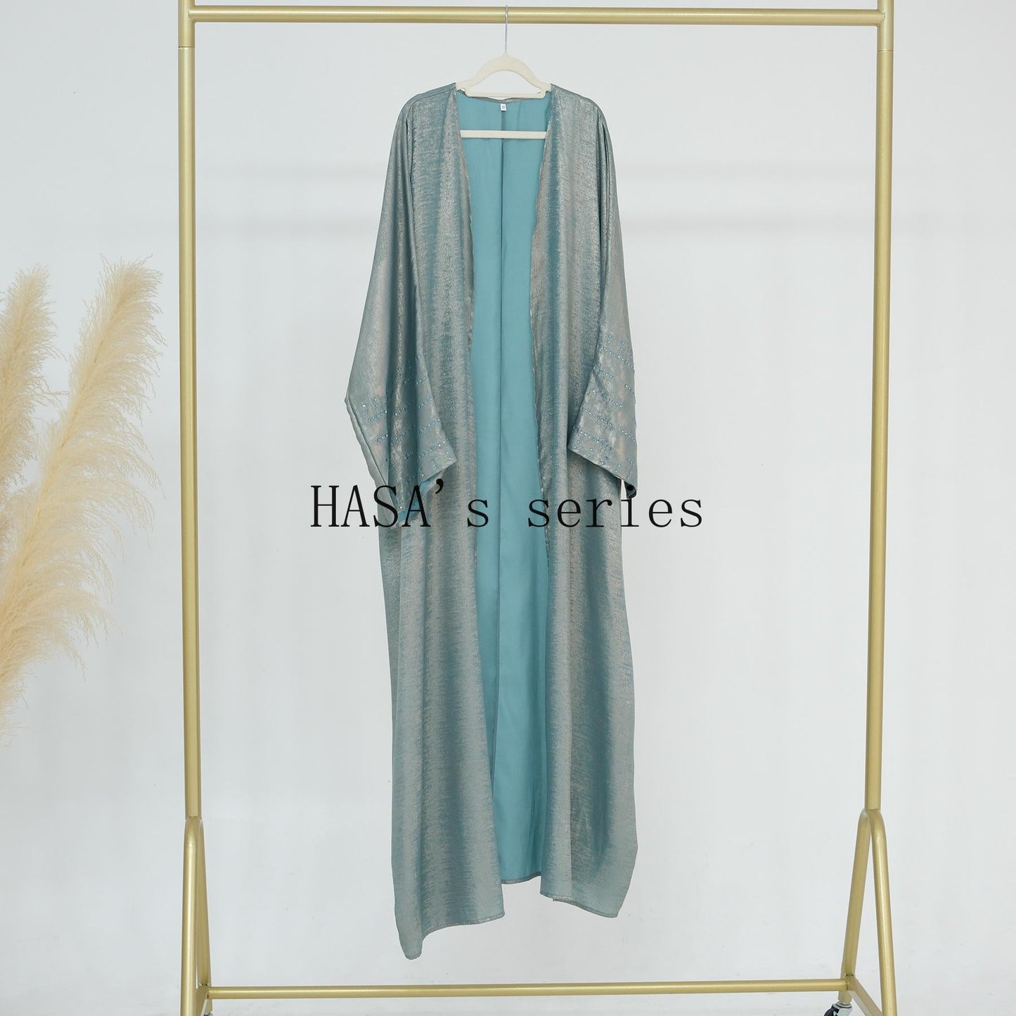 LUMAYA4844 A loose, long, robe-style dress made of velvet material, an elegant and sophisticated design with a refined texture.