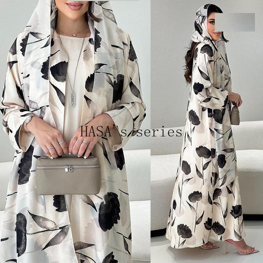 LUMAYA5092 A flowing, feminine floral-patterned robe, a loose-fitting printed cardigan-style dress paired with a headscarf.