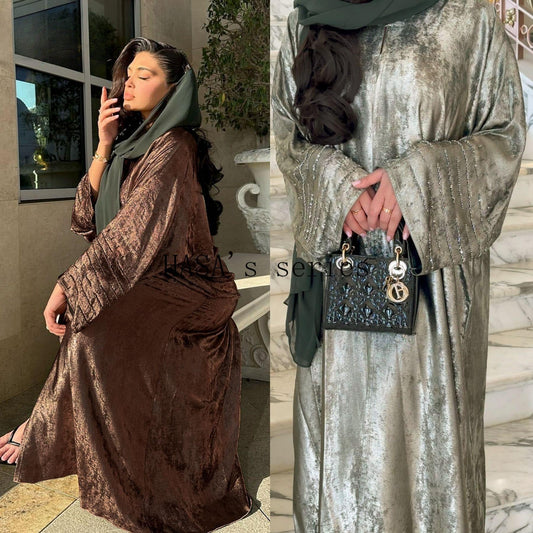 LUMAYA4844 A loose, long, robe-style dress made of velvet material, an elegant and sophisticated design with a refined texture.