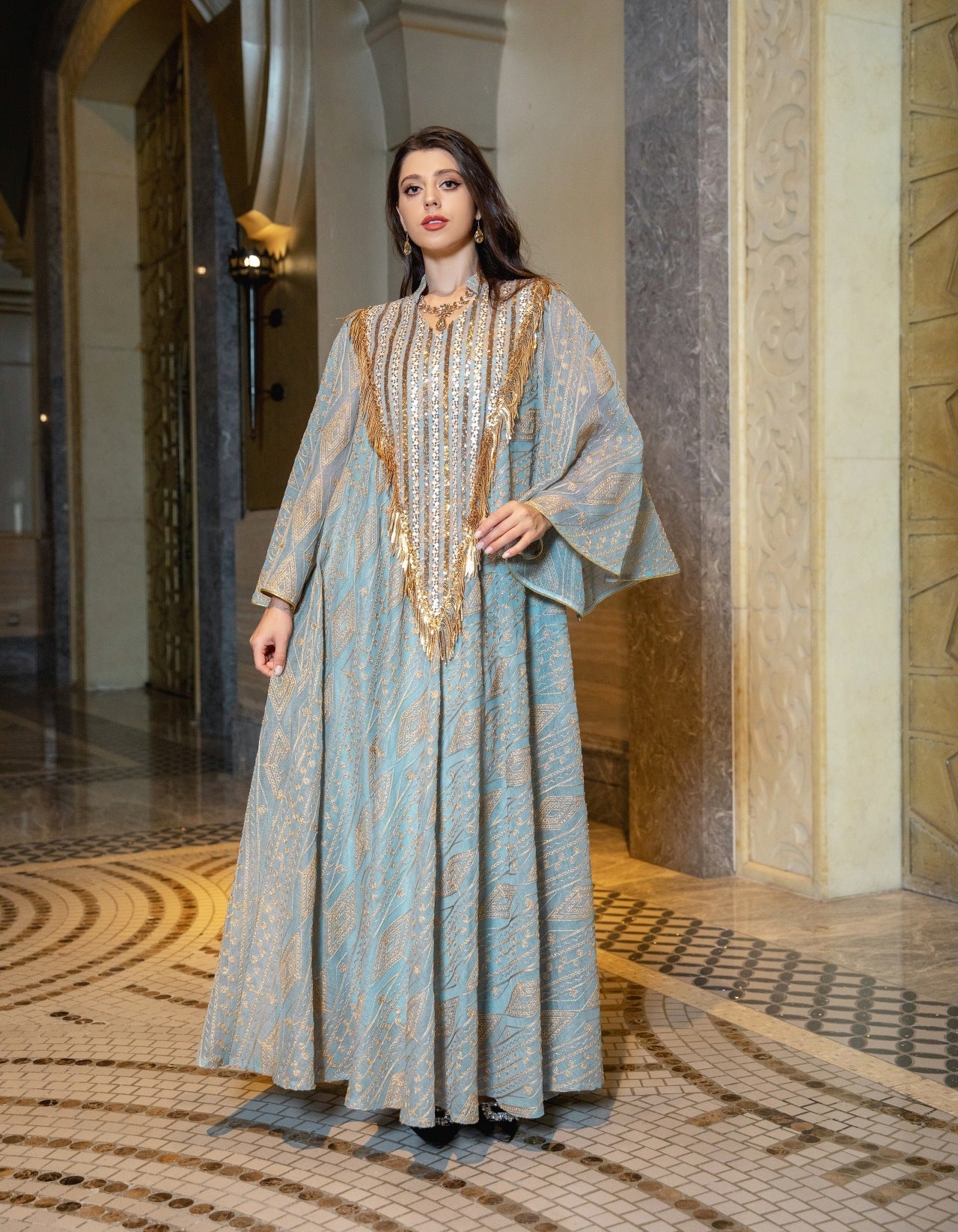 LM6648 A long robe with mesh sequins and embroidered details; an elegant and sophisticated dress.
