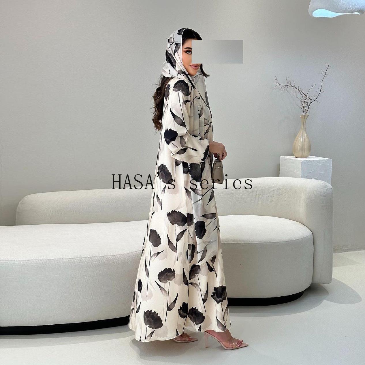 LUMAYA5092 A flowing, feminine floral-patterned robe, a loose-fitting printed cardigan-style dress paired with a headscarf.