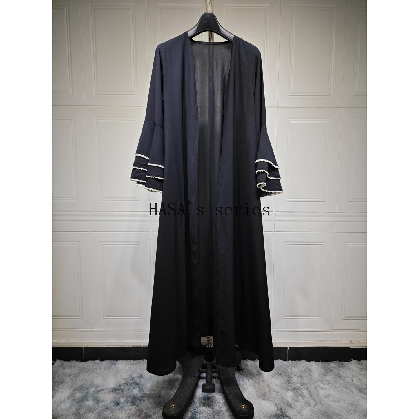 LUMAYA5093 Elegant black cardigan-style long robe with wide sleeves and a round-neck dress design featuring beaded embellishments.