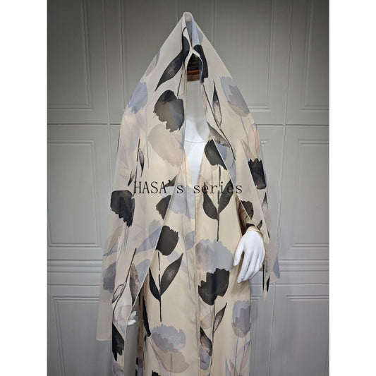 LUMAYA5092 A flowing, feminine floral-patterned robe, a loose-fitting printed cardigan-style dress paired with a headscarf.