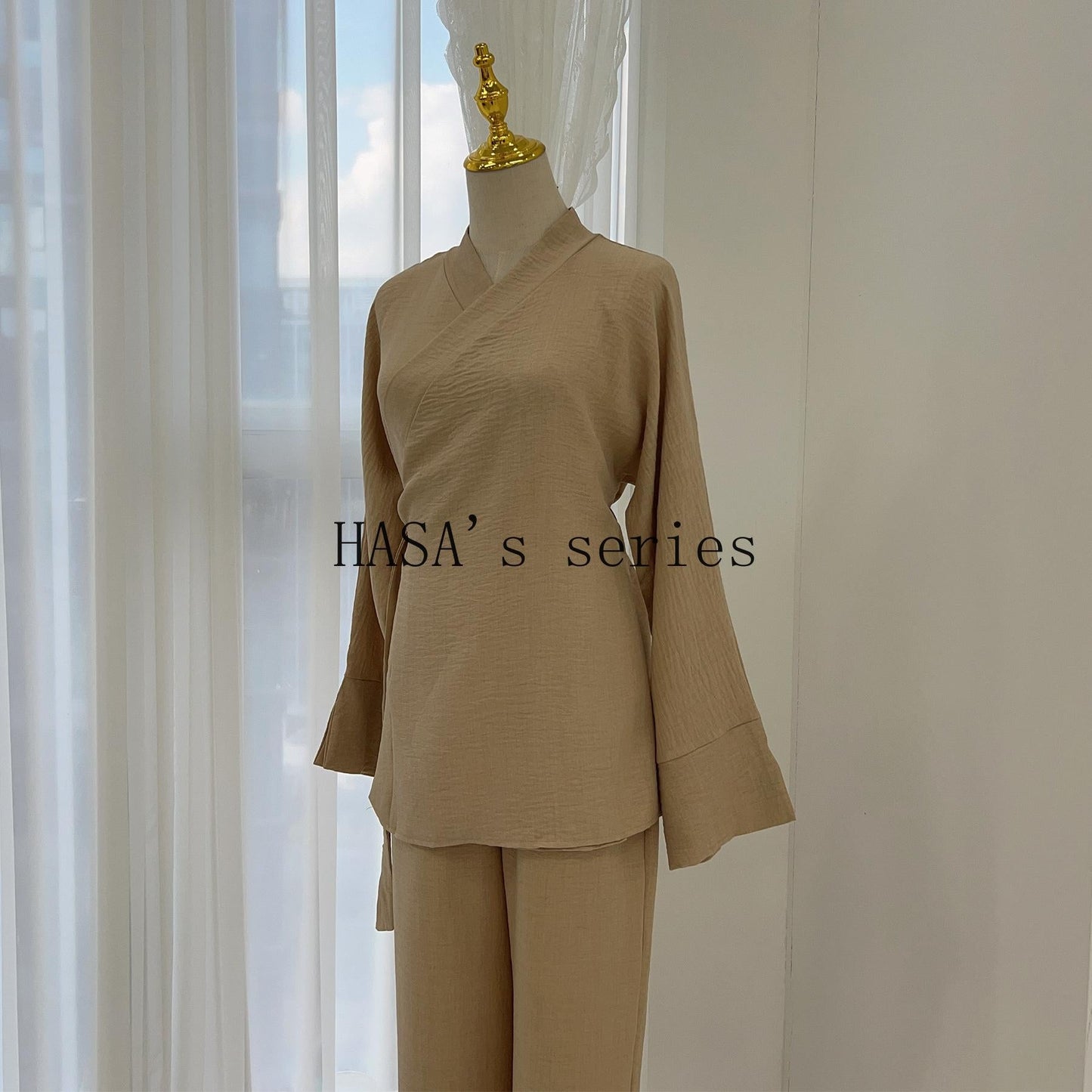 LUMAYA4842 A minimalist, beaded, matte satin long dress with a subtle and elegant design.