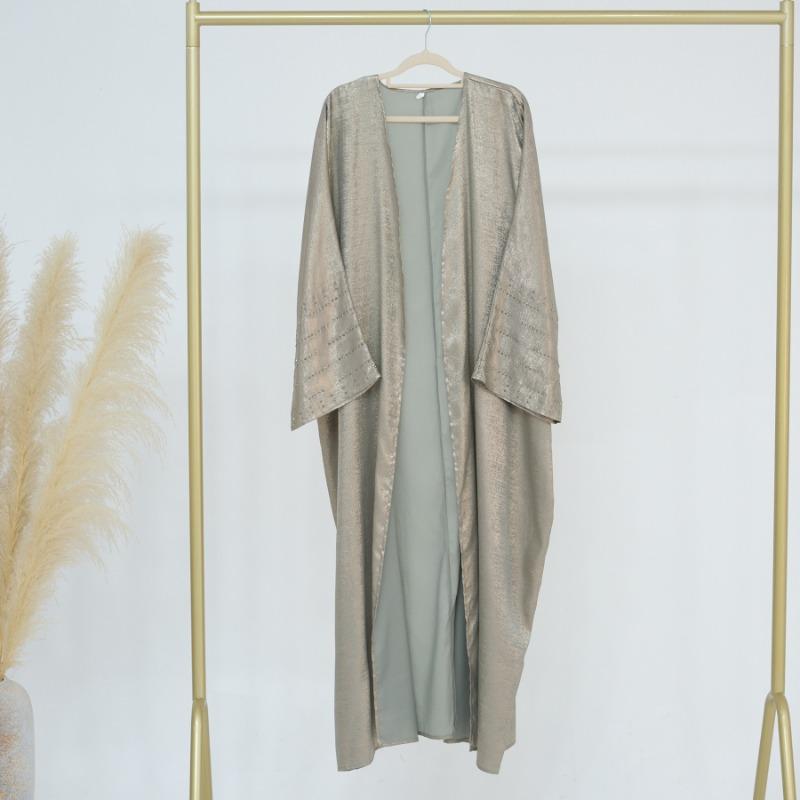 LUMAYA4844 A loose, long, robe-style dress made of velvet material, an elegant and sophisticated design with a refined texture.