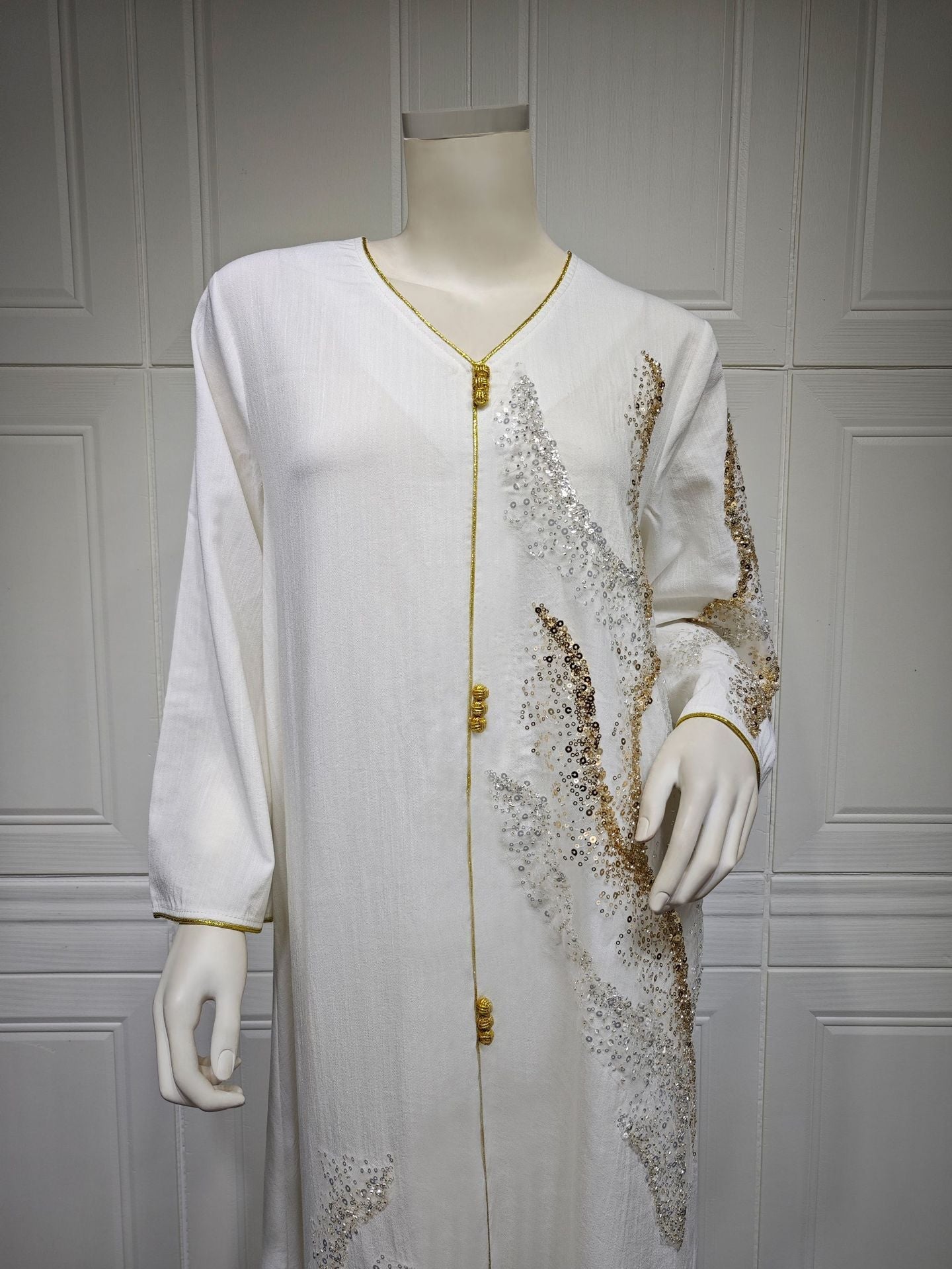 LM6659  Long-sleeved Sequined Embroidered Patchwork Dress with A Light Silhouette and Soft Color Scheme.