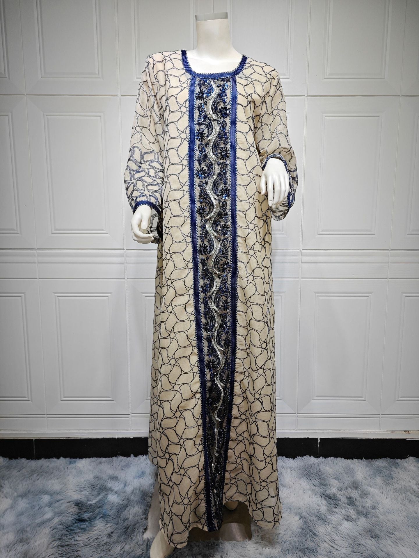 LM6668 A Simple and Elegant Long Dress Adorned with Mesh Embroidery.