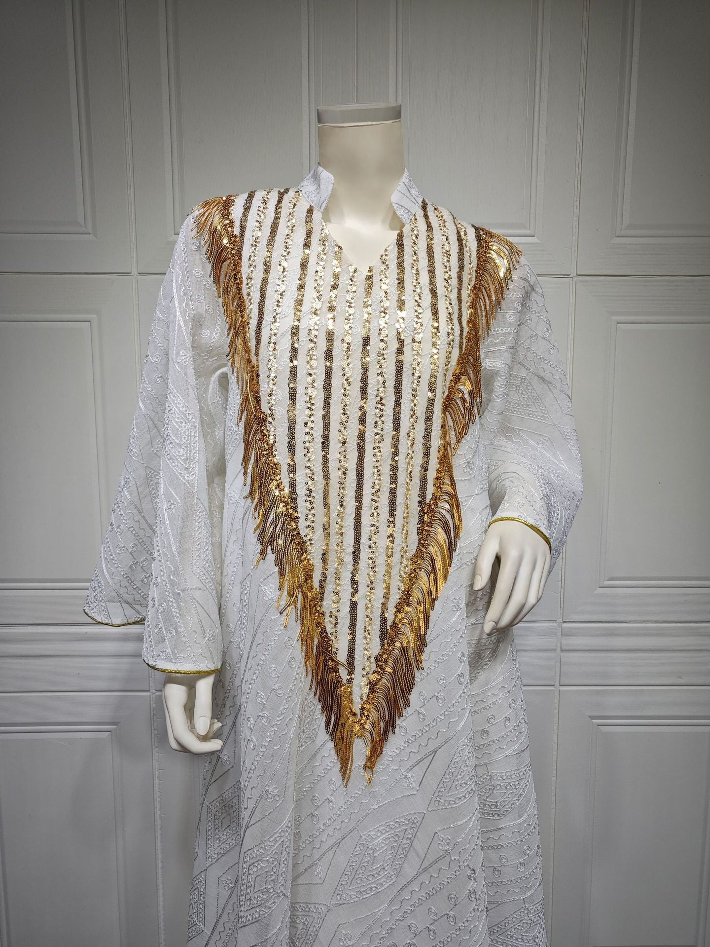 LM6648 A long robe with mesh sequins and embroidered details; an elegant and sophisticated dress.