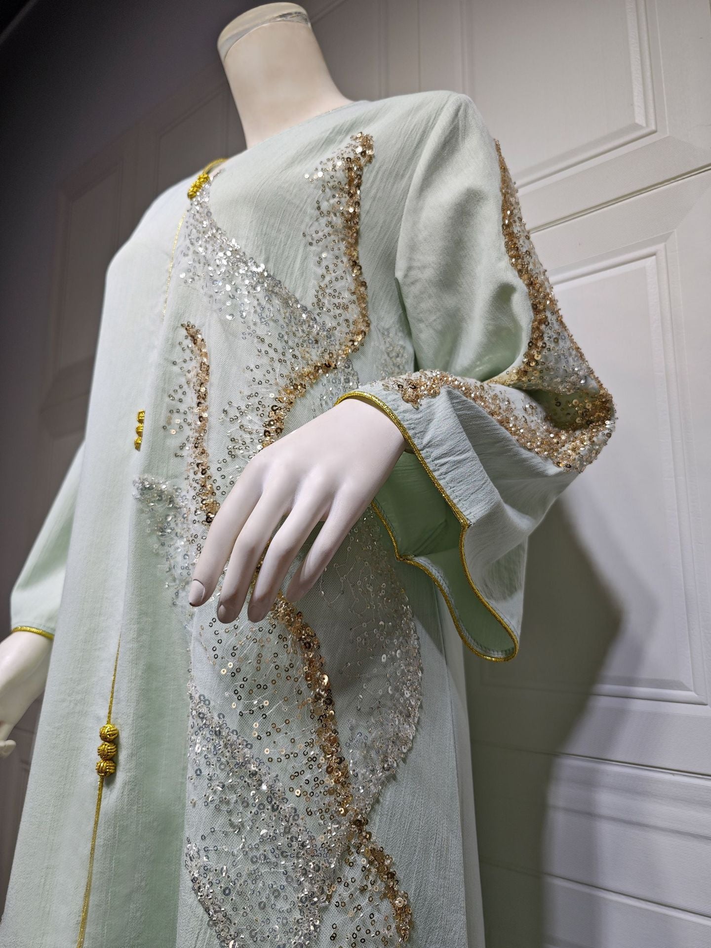 LM6659  Long-sleeved Sequined Embroidered Patchwork Dress with A Light Silhouette and Soft Color Scheme.