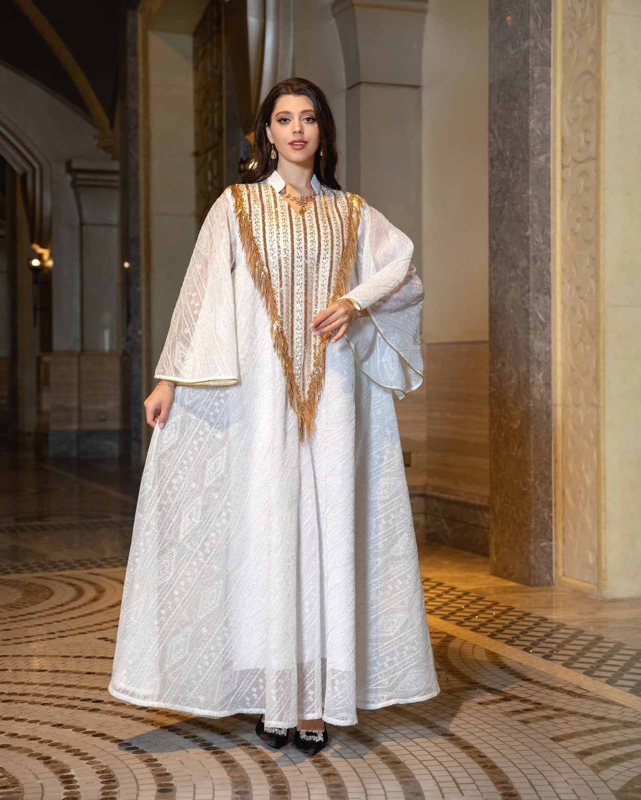 LM6648 A long robe with mesh sequins and embroidered details; an elegant and sophisticated dress.