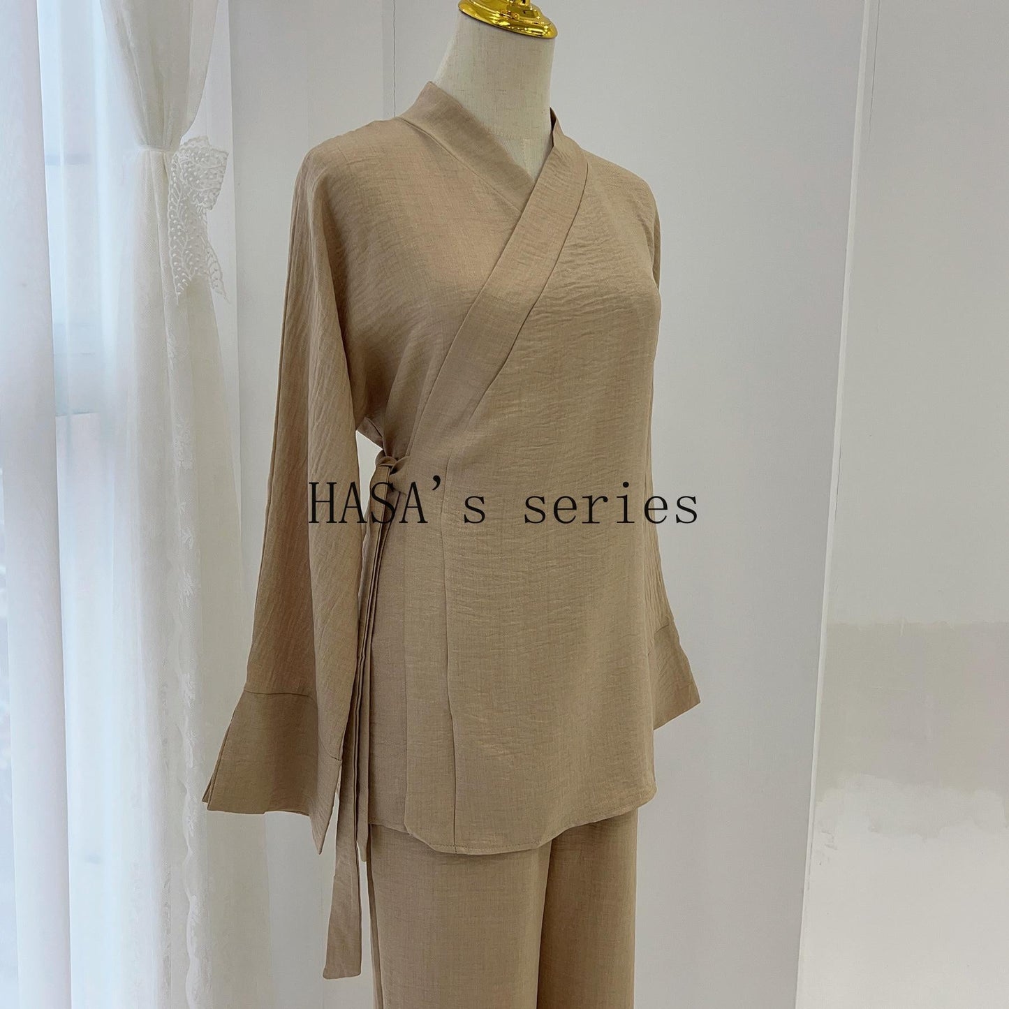 LUMAYA4842 A minimalist, beaded, matte satin long dress with a subtle and elegant design.