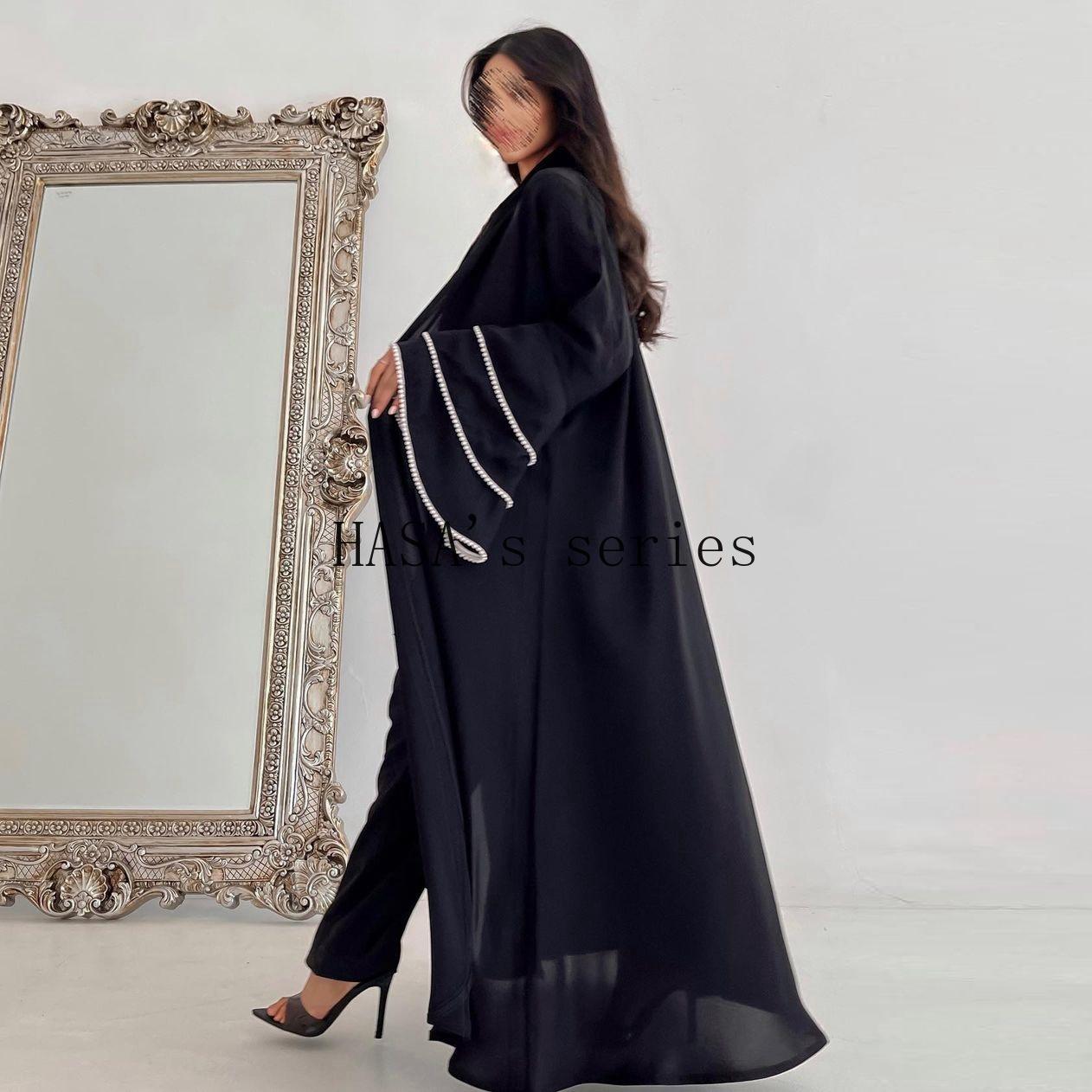 LUMAYA5093 Elegant black cardigan-style long robe with wide sleeves and a round-neck dress design featuring beaded embellishments.