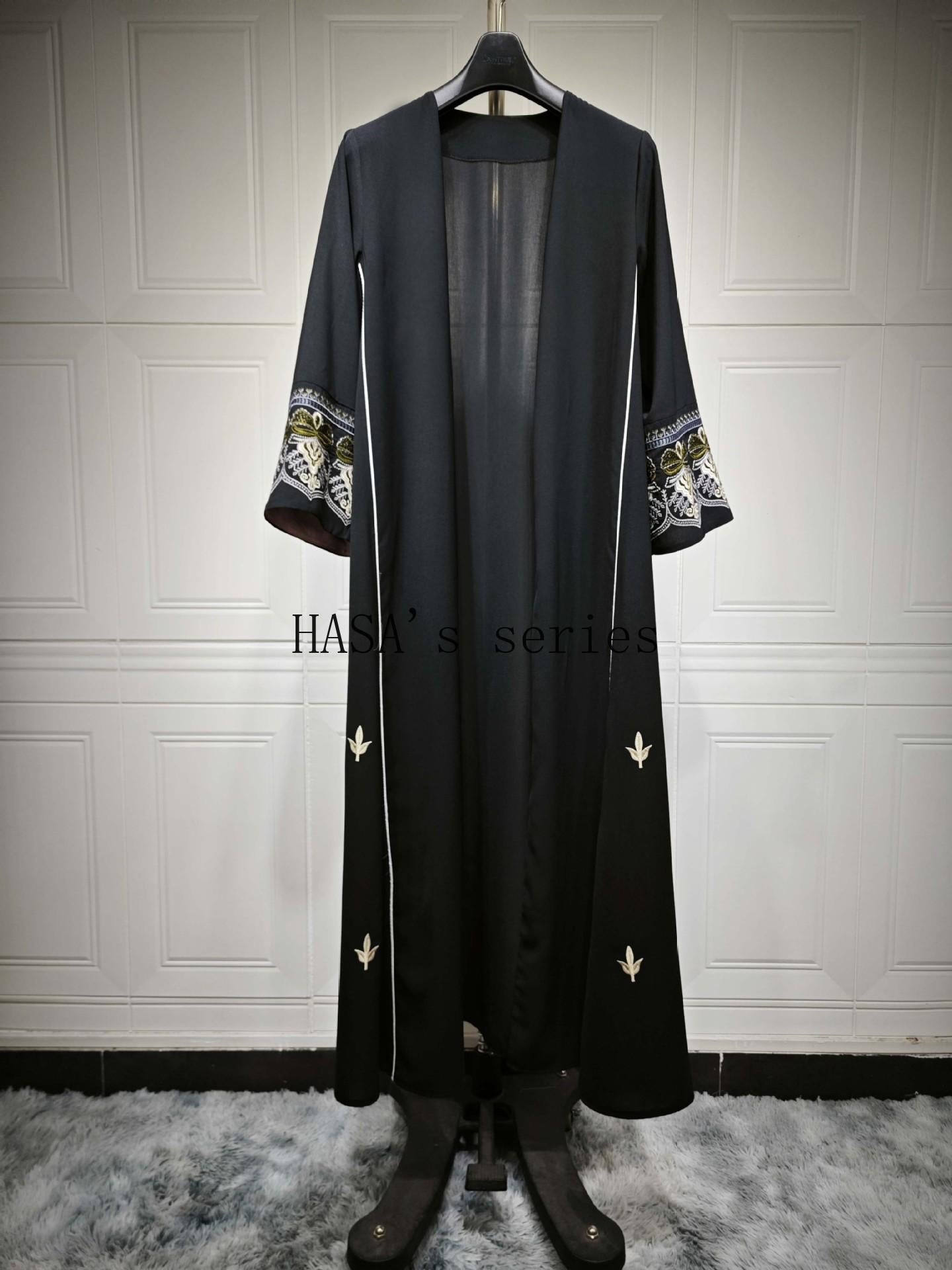 LUMAYA5090 Classic black embroidered patchwork robe, designed as a loose, open-front dress.