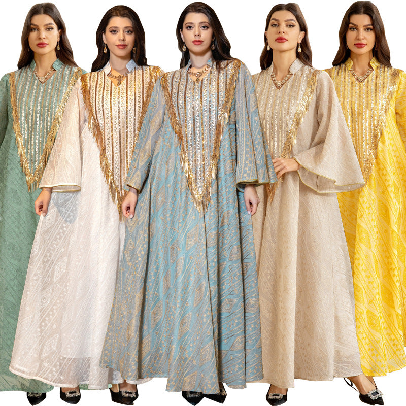 LM6648 A long robe with mesh sequins and embroidered details; an elegant and sophisticated dress.