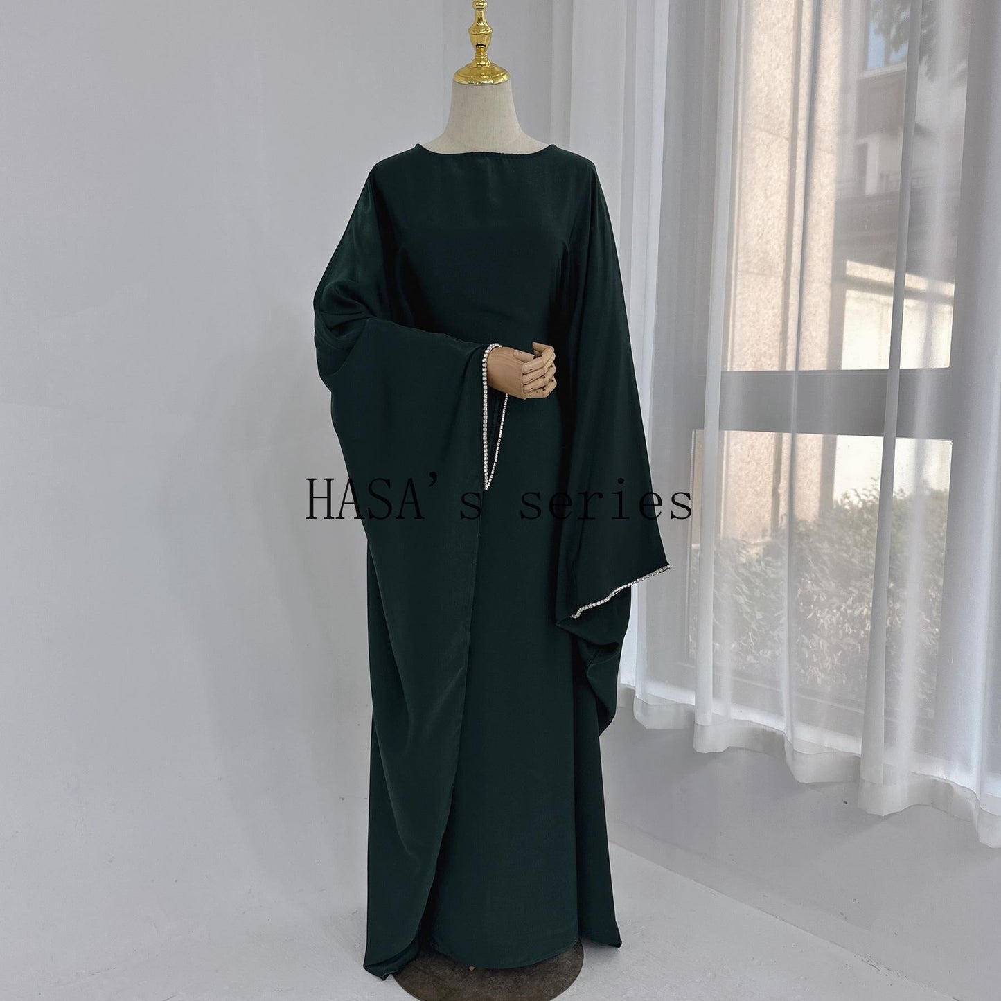 LUMAYA4841 A Minimalist, Beaded, Matte Satin Long Dress with A Subtle and Elegant Design.