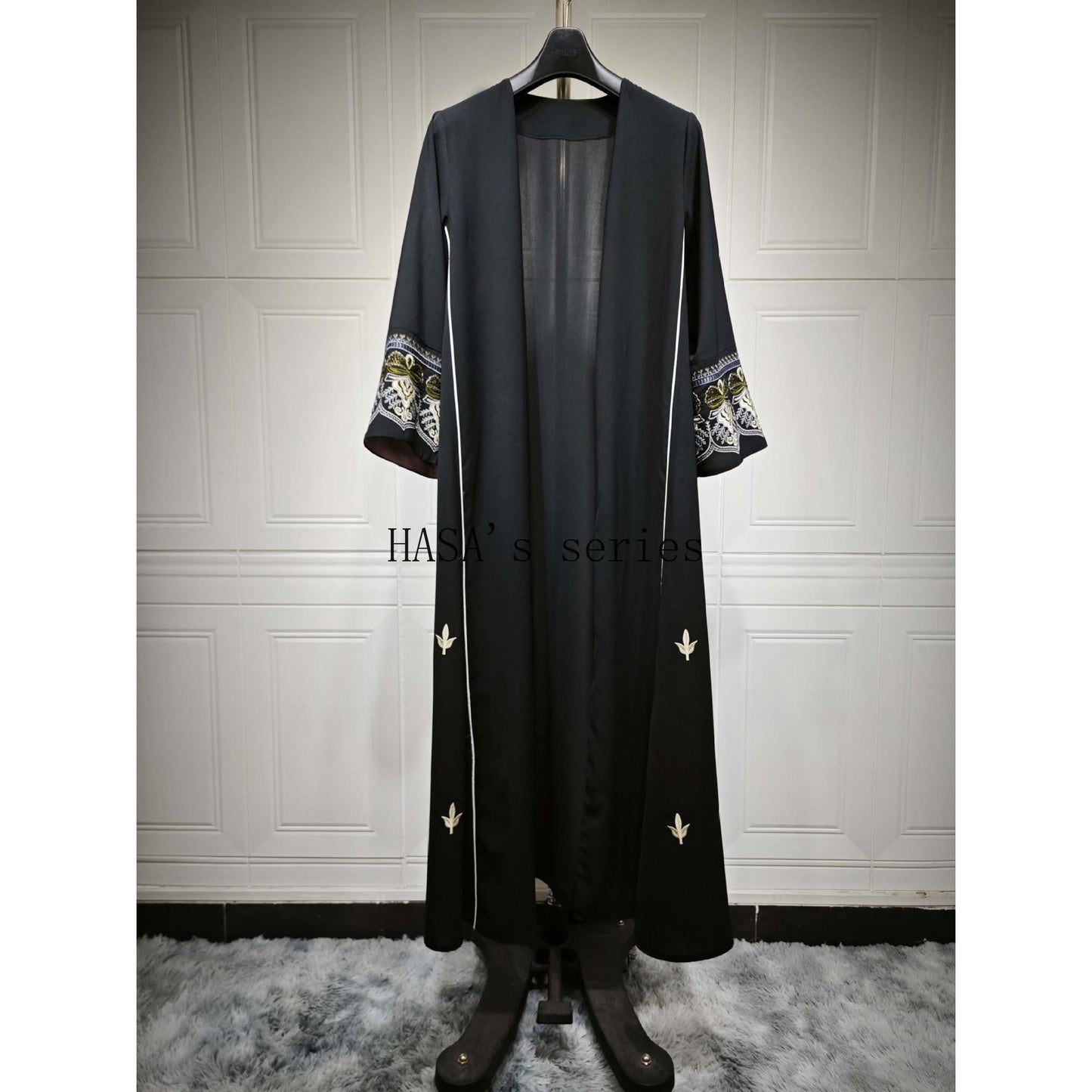 LUMAYA5090 Classic black embroidered patchwork robe, designed as a loose, open-front dress.