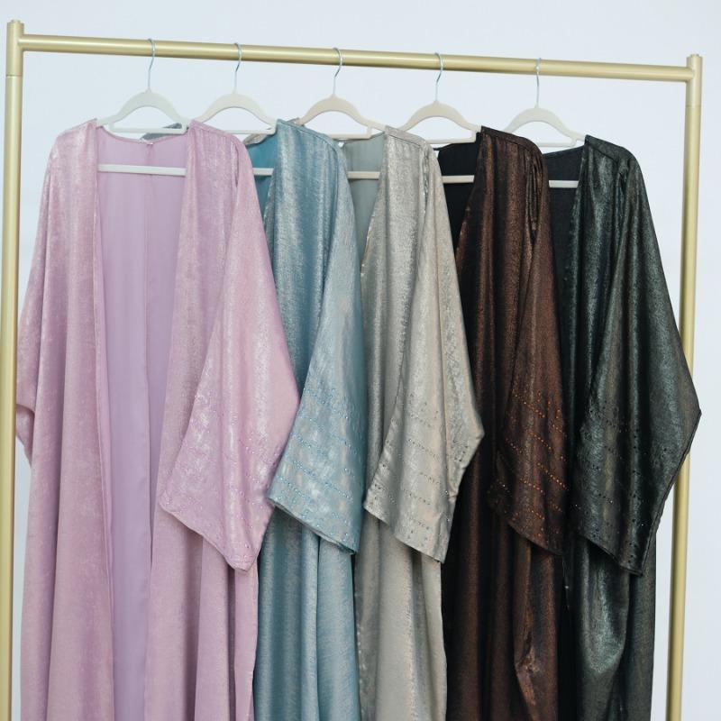 LUMAYA4844 A loose, long, robe-style dress made of velvet material, an elegant and sophisticated design with a refined texture.