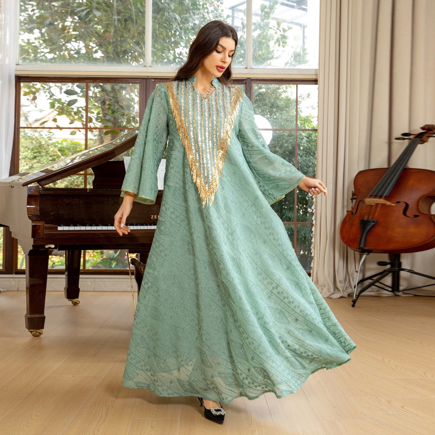 LM6648 A long robe with mesh sequins and embroidered details; an elegant and sophisticated dress.
