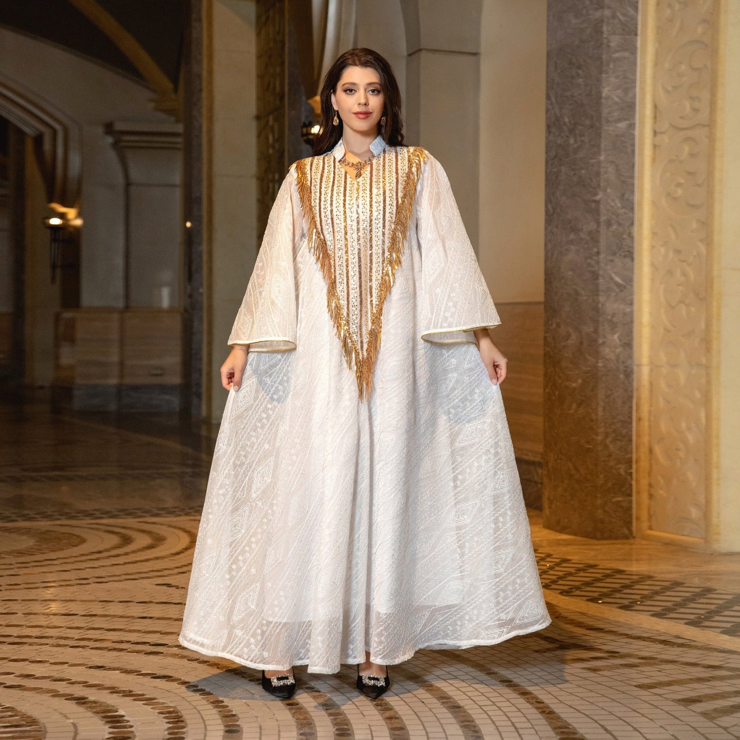LM6648 A long robe with mesh sequins and embroidered details; an elegant and sophisticated dress.